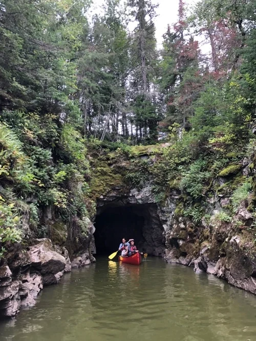 Canoeing through a cave