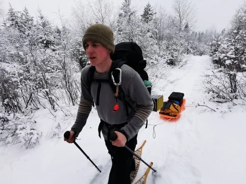 Tour guide snow shoeing