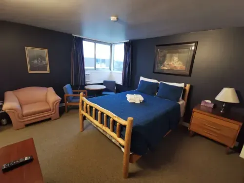 Bachelor suite blue bed